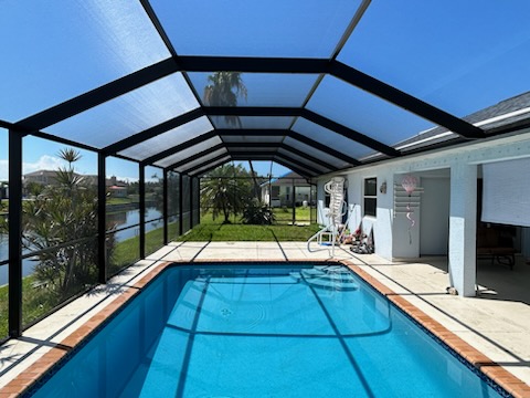 blue pool with a transparent cover